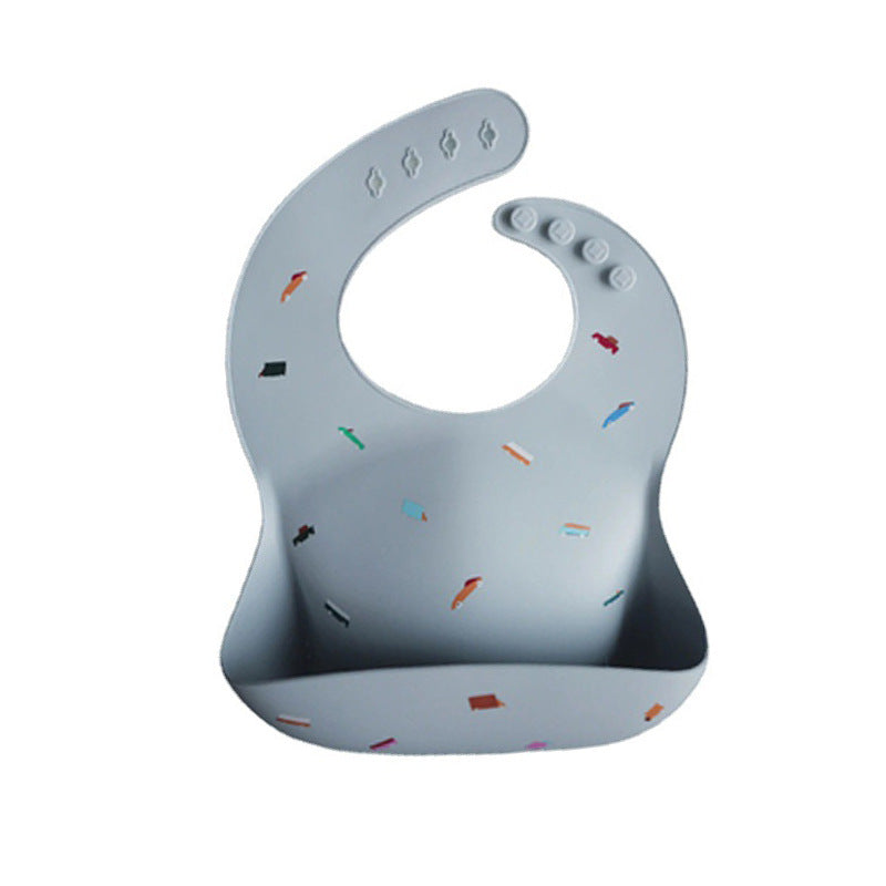 Mushie Silicone Baby Feeding Bib with Waterproof Food Catcher Pocket