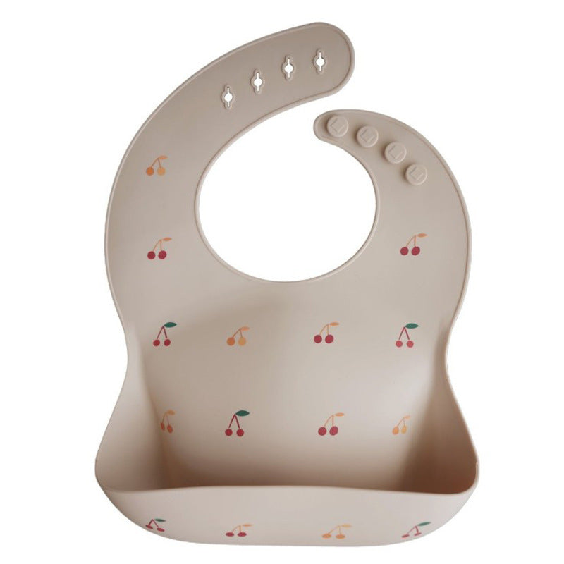 Mushie Silicone Baby Feeding Bib with Waterproof Food Catcher Pocket
